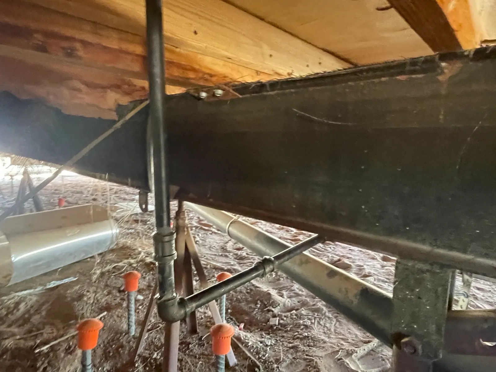 Black-iron gas riser and branch line under the home